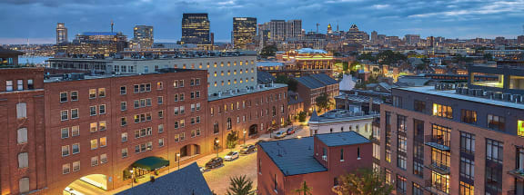 Aeriel view of building and downtown skyline at The Crescent at Fells Point by Windsor, Baltimore, Maryland