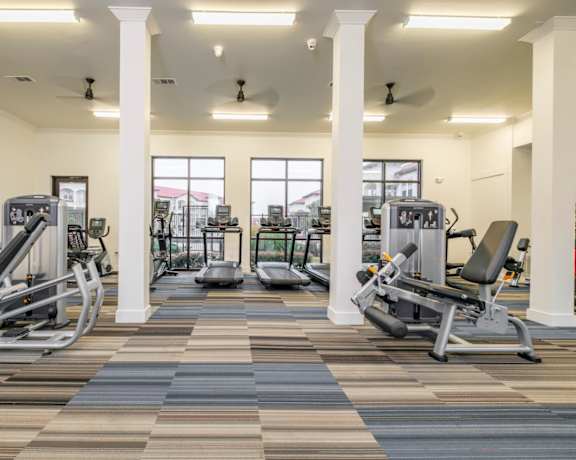 fitness center at Reveal Lake Ridge apartments