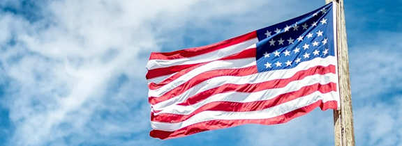 The American flag is waving in the wind.