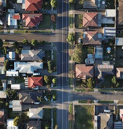 an aerial view of a suburb suburban houses