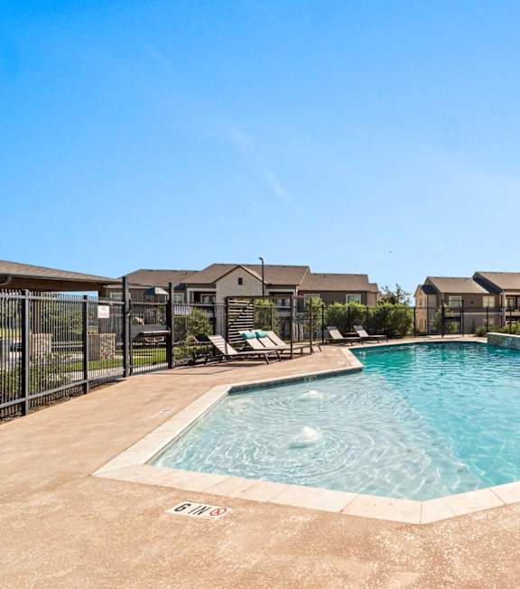 A large outdoor swimming pool at Residences at the Landing, Texas