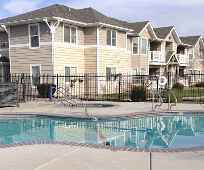 Image of swimming pool next to building
