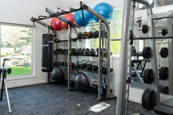 a rendering of a fitness room with treadmills and other exercise equipment