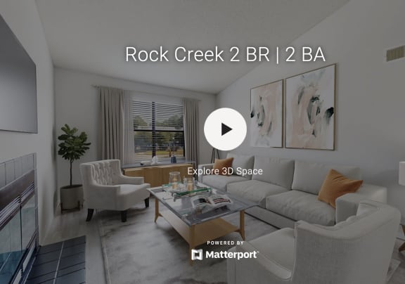 the Rock Creek 2-bed, 2-bath virtual tour start screen of a living room with model furnishings