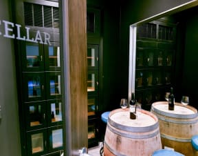 a view of the cellar door and wine barrels inside Main Street Lofts Cupertino