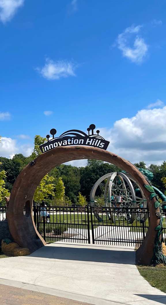 A large archway with the words "Innovation Hills" on it.