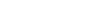 A sign that says "Ship's Watch Apartments" in white text on a green background.
