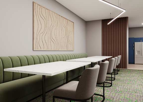 A conference room with a long table and chairs at Bloom, Monona, 53716