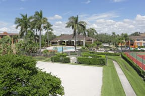 Overview of the sand volley ball court, tennis area, pool and grilling stations