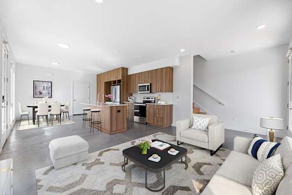 a living room with a couch and a table