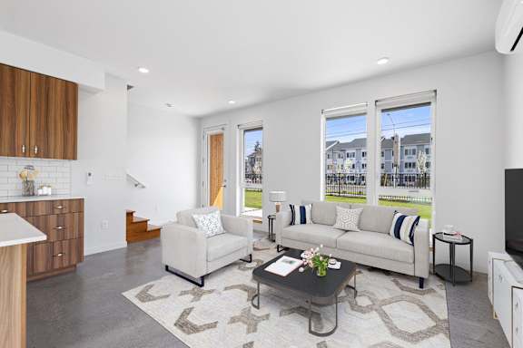 a living room with a couch and a coffee table