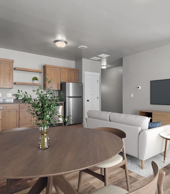 A modern kitchen with a wooden table and chairs.