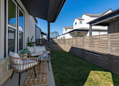 Thumbnail 15 of 24 - Private fenced backyard at parcHAUS at Celina Parkway, Celina, TX, 75009. The perfect upgrade from a small apartment balcony.