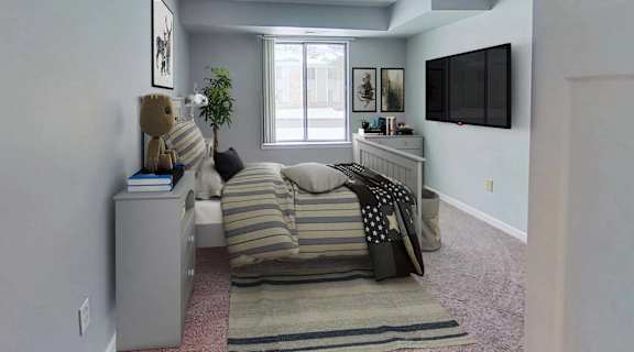 a bedroom with a bed and a tv