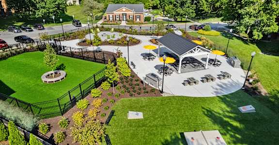 a community park with a games, firepit, dog park and a pavilion at Courthouse Square Apartments, Towson, 21286