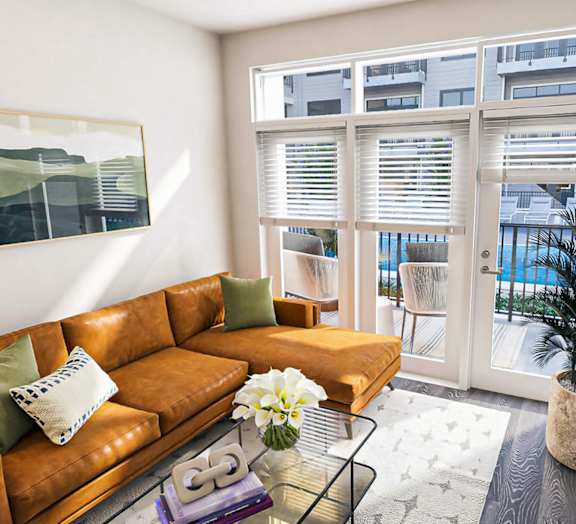 Gorgeous Living Room with large, oversized windows at Link Apartments 4th Street in Winston Salem Art District