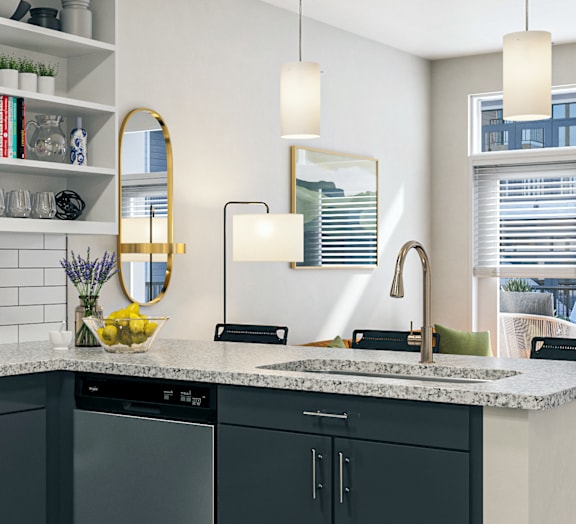Kitchen with Dark Blue Cabinets and Granite Countertops at Link Apartments 4th Street in Winston-Salem, 27101