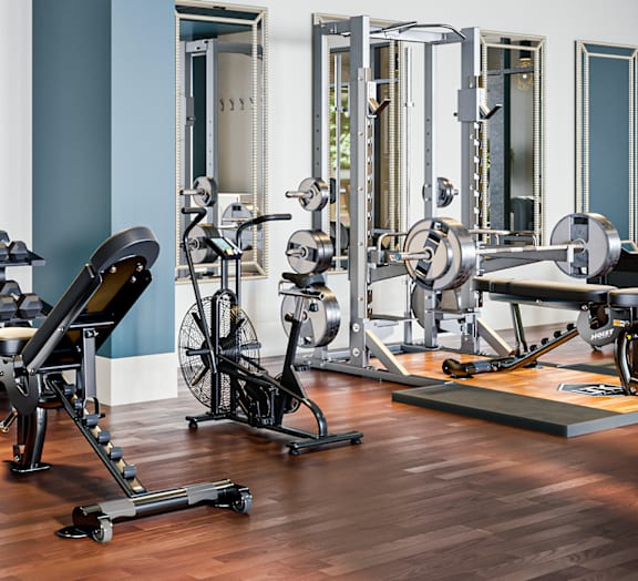 Large Fitness Center with Cardio Equipment and Free Weights at Link Apartments 4th Street in North Carolina, 27101