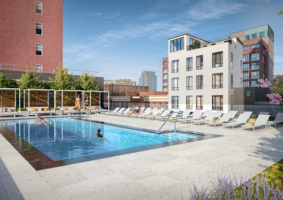 a view of the rooftop pool at the graduate madison hotel in madison, wi