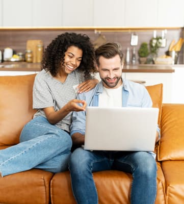 Lifestyle photo of couple on the couch