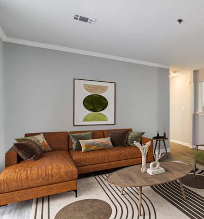 a living room with a couch and a coffee table