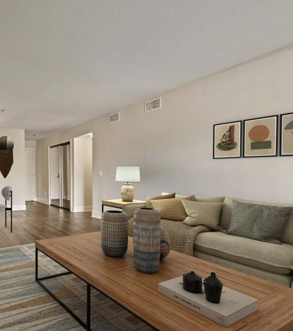 a living room with a couch and a coffee table at Atrium, California