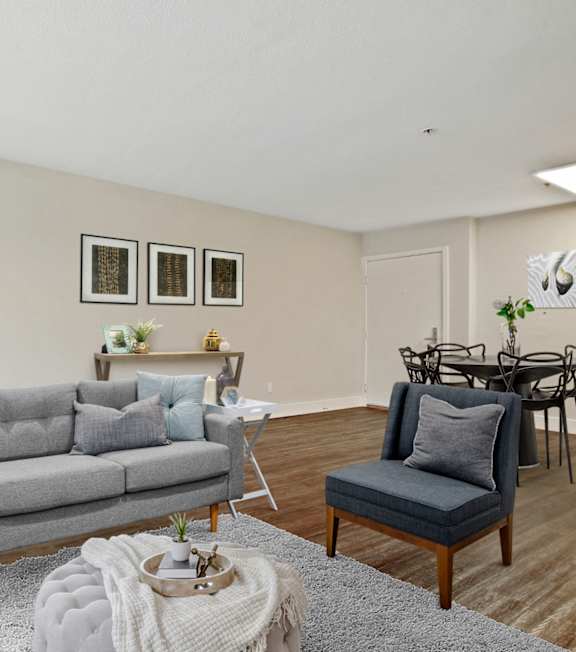 a living room with a couch and a coffee table at Atrium, California