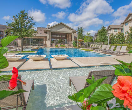 take a dip in the resort style pool at Ovation at Lewisville Apartments, Texas , 75067