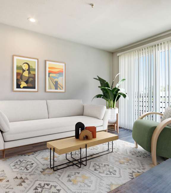 a living room with a spiral staircase and a couch and a table at 430 Kelton, Los Angeles