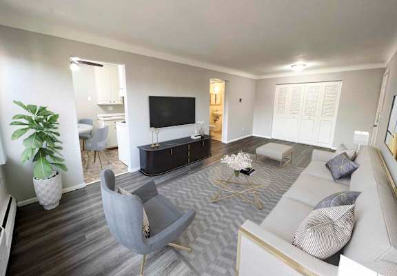 a living room with a couch and a tv