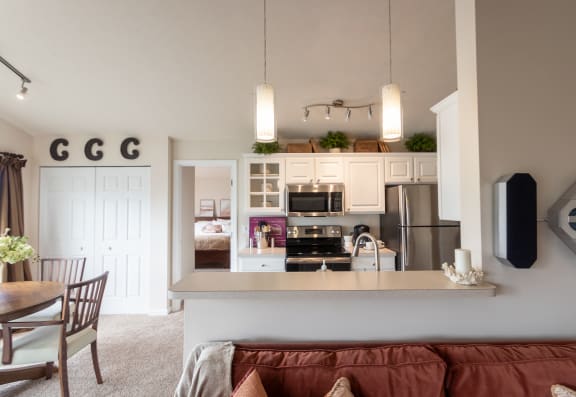 This is a photo of the kitchen of a 1245 square foot 2 bedroom apartment at Cambridge Court Apartments in Dallas, TX.