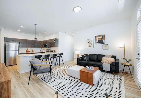 a living room with a couch and a table