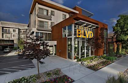 A building with a sign  at Liberty Blvd Apartments - Saltlake City, UT Apartments, Saltlake City, Utah