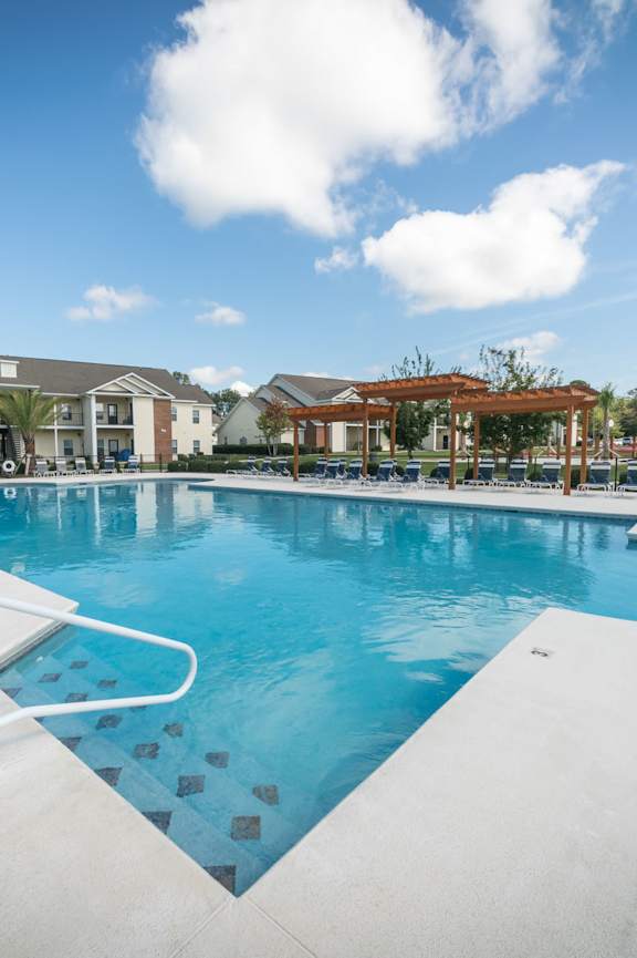 the pool area at the resort at longboat key club
