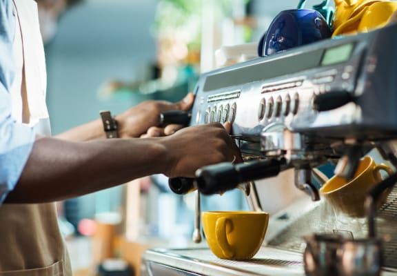 Barista Making a Cup of Coffee at The Oxford Apartments, Oxon Hill, MD 20745