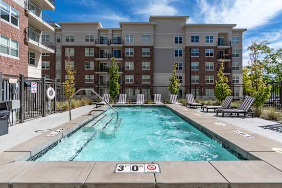 Resort style pool with lounge chairs2 at 200 City View, Provo, Utah