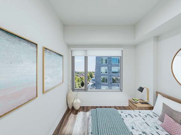 Bedroom with picture window & ample closet space