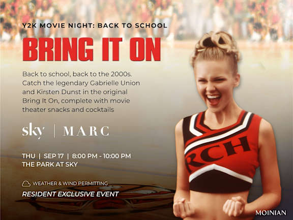 A poster advertises a movie night at The Park at Sky with a cheerleader in the foreground.