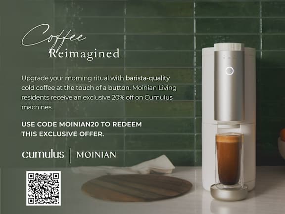 An advertisement for a coffee machine at MARC Apartments, New York, 10019