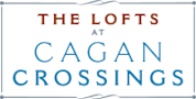 A sign that says "The Lofts at Cagan Crossings.".