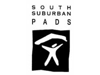 A black and white image of a person under an umbrella with the words "South Suburban Pads" above it.