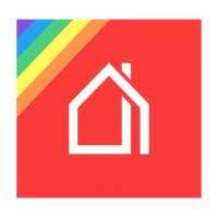 a red house with a rainbow flag in the background