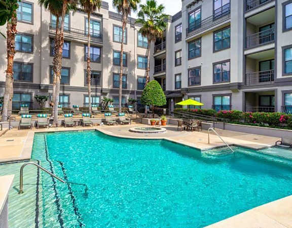 3000 Sage - Resort-style pool with heated spa and surrounding sun ledge