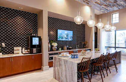 a dining room with a bar and a television