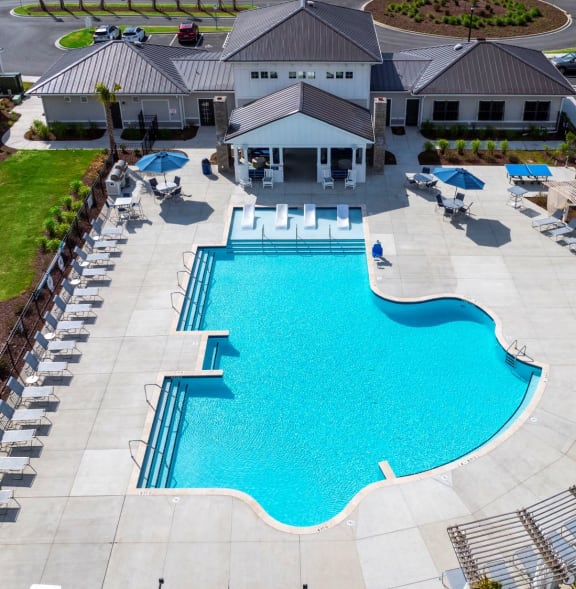 an aerial view of the pool at the resort at longboat key club