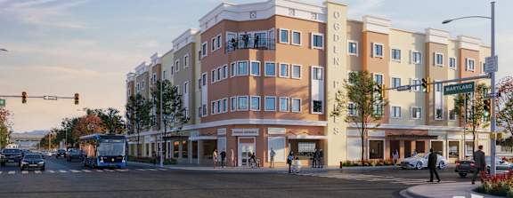 A street view of a building with the words "OGDEN" on the side.