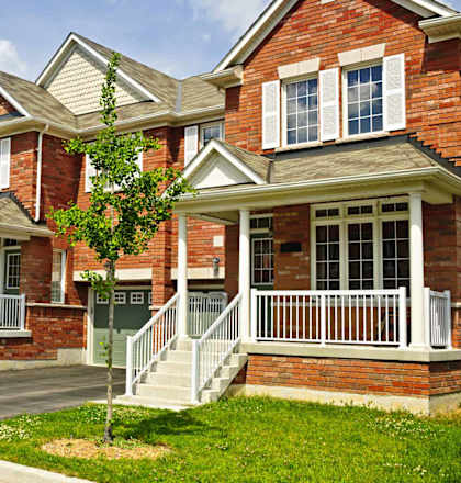 a row of brick houses on a street