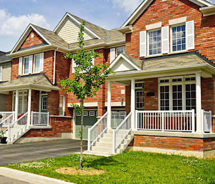 a row of brick houses on a street