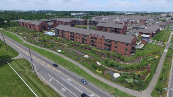 an aerial view of a large brick building with a garden in front of it  at Hayden Lofts Apartments, Dublin, 43016