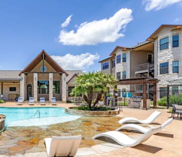 Swimming Pool With Relaxing Sundecks at Park Hudson Place Apartments, Bryan, Texas